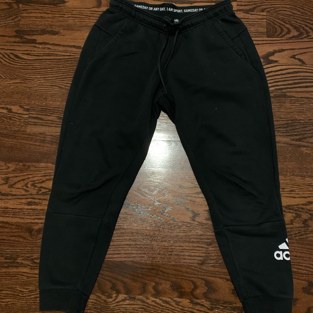 Adidas black joggers.